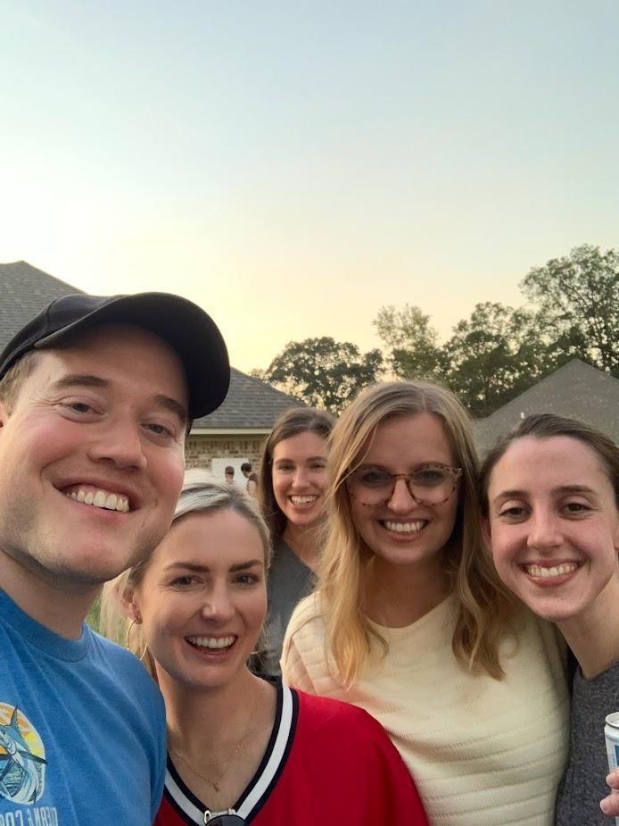 outdoor group picture of five pediatric residents